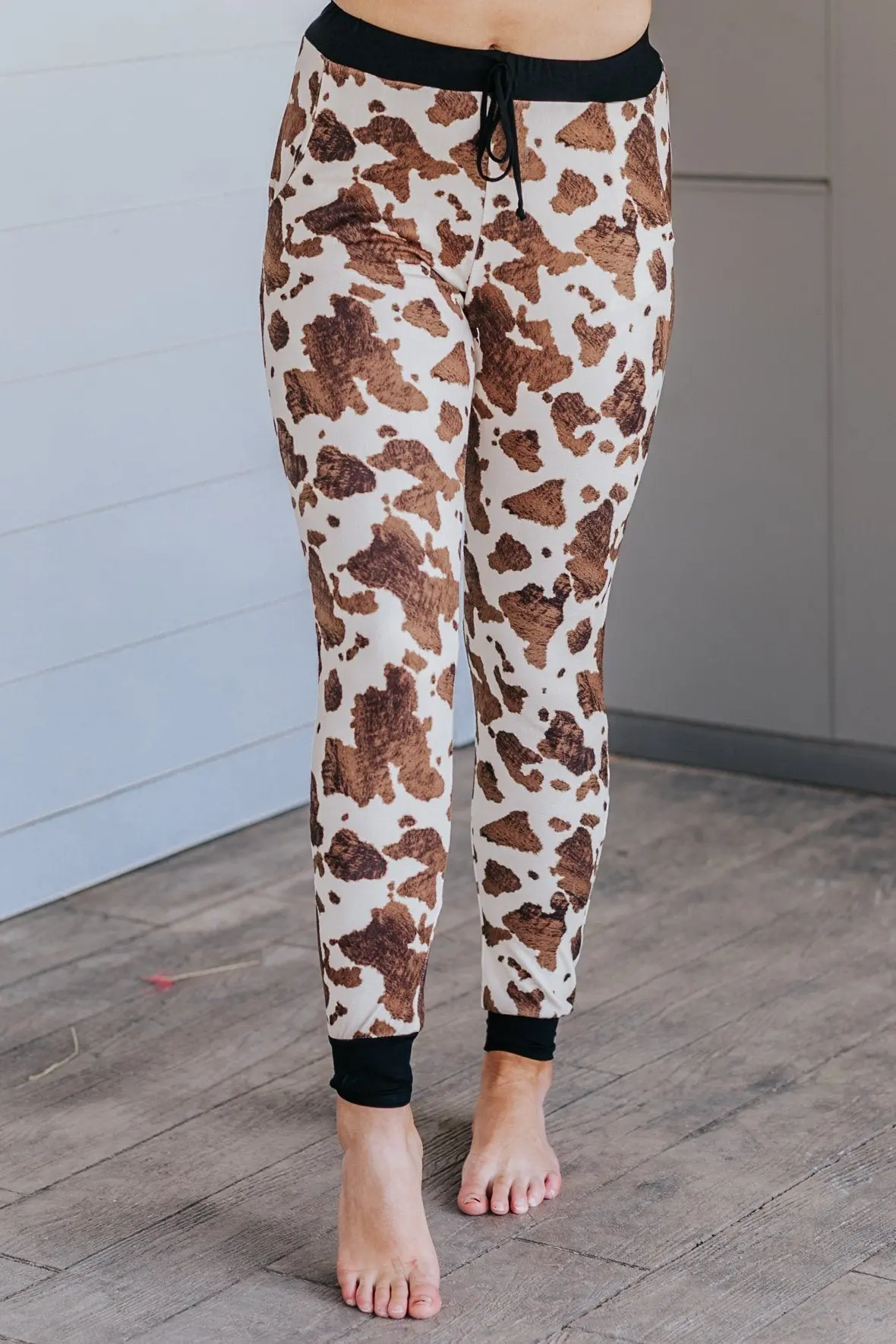 Keep The Faith Cow Print Jogging Pants In Brown 1